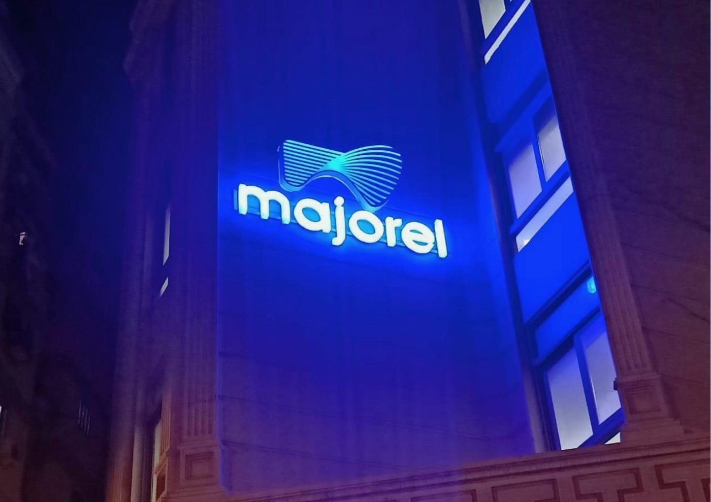 Majorel illuminated building sign by essence